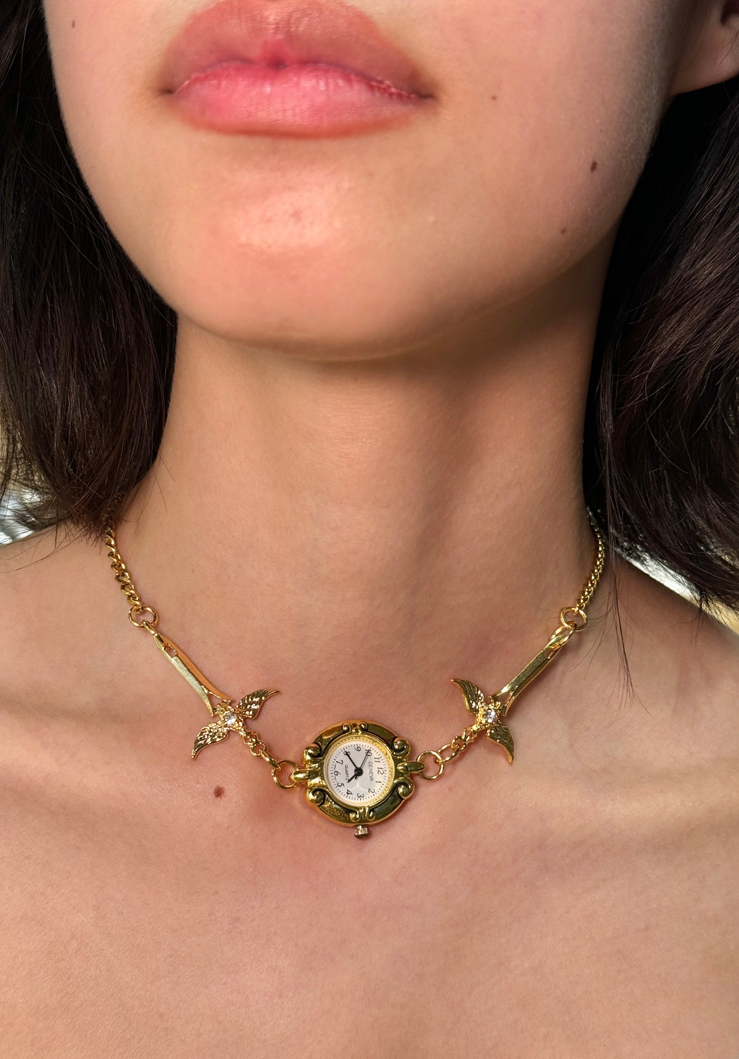 Gold Circular Watch and Sword Necklace