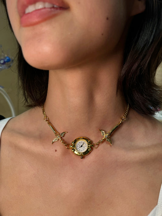 Gold Circular Watch and Sword Necklace